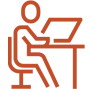 Employee Sitting at a Desk Icon